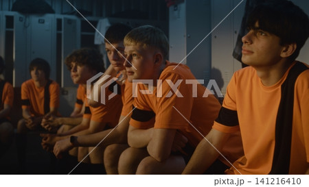 Sport Education and Theory, Coach Briefing Young Players in Locker Room 141216410