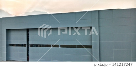 Building facade with gray wall panels Building facade with gray wall panels 141217247