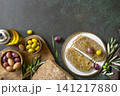 Italian ciabatta bread with olive oil on a stone surface. Delicious and healthy food. Vegan. Top view flat lay background. Copy space. 141217880