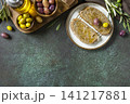 Italian ciabatta bread with olive oil on a stone surface. Delicious and healthy food. Vegan. Top view flat lay background. Copy space. 141217881