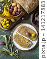 Italian ciabatta bread with olive oil on a stone surface. Delicious and healthy food. Vegan. Top view flat lay background. 141217883