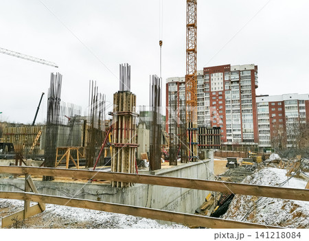 Urban construction site with concrete foundations and steel reinforcement structures Urban construction site with concrete foundations and steel reinforcement structures 141218084