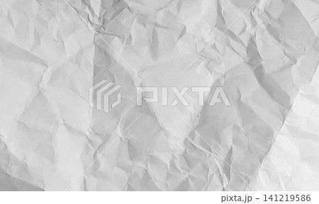 Worn paper texture with creases and rough surface. White sheet background perfect for vintage 141219586