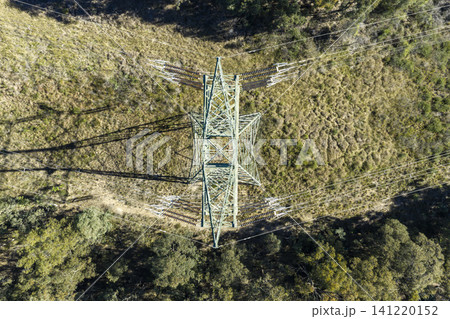 Looking down into an electrical transmission tower steel structure and cables 141220152