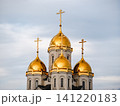 Volgograd, Russia - 05.23.2023: All Saints Church on Mamayev Kurgan. Stunning golden domes of an Orthodox church symbolizing faith and heritage. 141220183