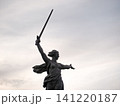 Volgograd, Russia - 05.23.2023: Low angle view of The Motherland Calls statue on Mamayev Kurgan in Volgograd, Russia. One of the tallest statues in the world, symbolizing the Soviet victory in World W 141220187