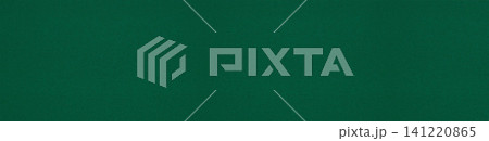 Solid emerald green corduroy fabric texture with fine ribbed wales 141220865