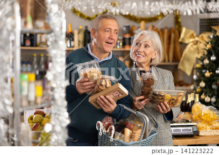Elderly spouses choose consider nougat, panettone, marzipan, cookies, chocolate Elderly spouses choose consider nougat, panettone, marzipan, cookies, chocolate 141223222