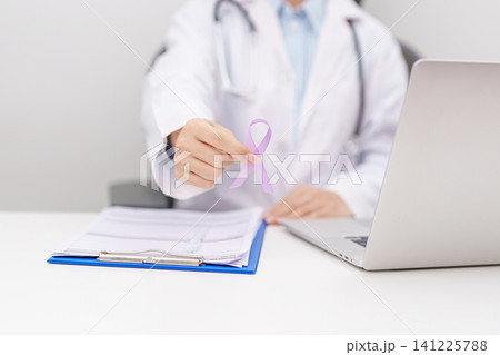 Doctor give light purple ribbon for concept of All cancer, April Esophageal Cancer, November gastric and Stomach cancer, Hodgkin Lymphoma, Awareness month and February World cancer day concept Doctor give light purple ribbon for concept of All cancer, April Esophageal Cancer, November gastric and Stomach cancer, Hodgkin Lymphoma, Awareness month and February World cancer day concept 141225788