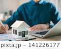 Signing real estate contract property mortgage finance approved home buying document for homeowner house tenant investment insurance, professional using laptop at office workspace 141226177