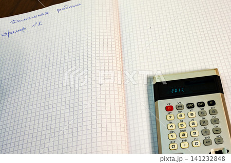 The pages open notebook lay calculator The pages open notebook lay calculator 141232848