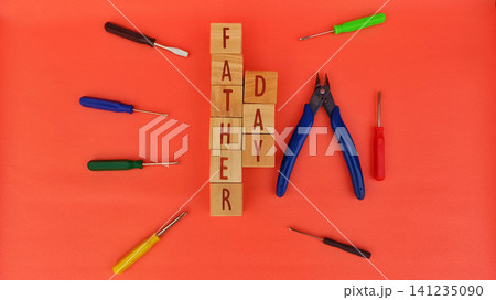 Fathers Day DIY Tools Arrangement with Wooden Blocks and Screwdrivers Fathers Day DIY Tools Arrangement with Wooden Blocks and Screwdrivers 141235090