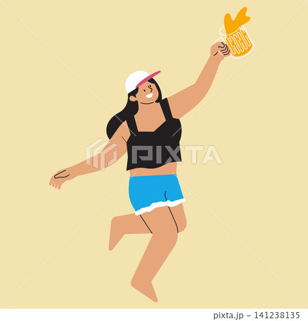 A woman in casual summer clothes holds up a beer mug as she jumps in the air. She shows excitement and joy during a moment of celebration outside. 141238135