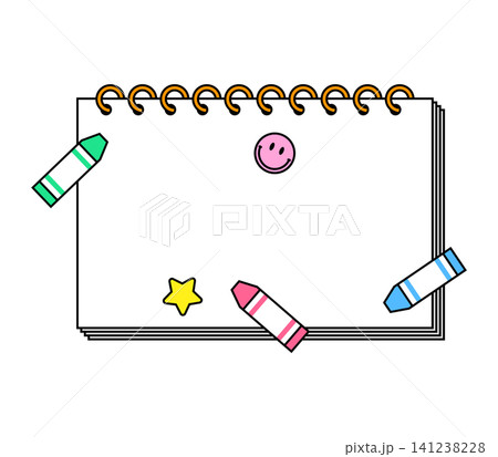 A blank notebook lies open with two crayons placed on each side. A smiley face sticker and a star sticker are on the page. The scene is simple and clean. 141238228