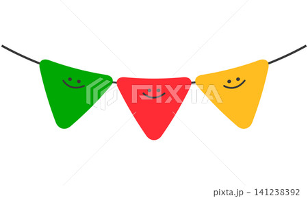 Bunting flags in green, red, and yellow are hanging across a space. Each flag displays a simple smiling face. This setup is common at outdoor gatherings and celebrations. 141238392