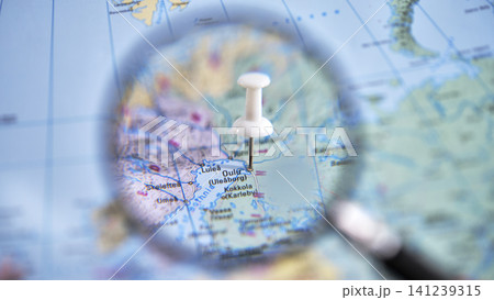 A close-up of a printed map with Oulu marked at a specific location. A close-up of a printed map with Oulu marked at a specific location. 141239315