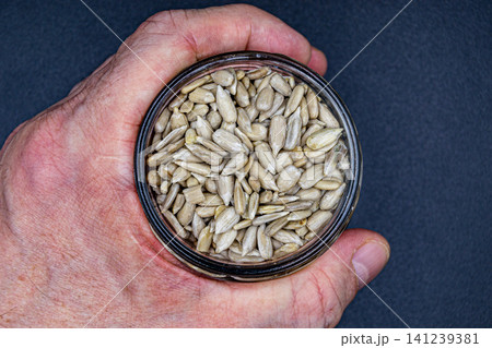 beautiful texture ripe of natural sunflower seeds on background beautiful texture ripe of natural sunflower seeds on background 141239381