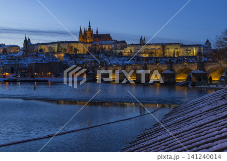 Prague Castle and Charles Bridge in winter at dusk Prague Castle and Charles Bridge in winter at dusk 141240014