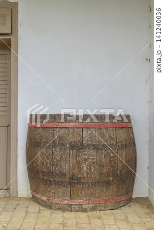 Old wooden wine barrel standing in Palkonya cellar Old wooden wine barrel standing in Palkonya cellar 141240036