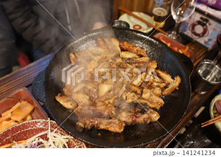 Sizzling Korean BBQ on Iron Griddle Sizzling Korean BBQ on Iron Griddle 141241234