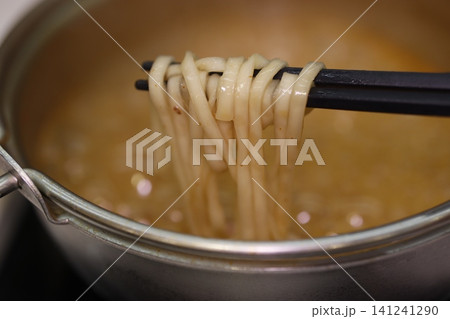 Noodles with Chopsticks in Broth Noodles with Chopsticks in Broth 141241290