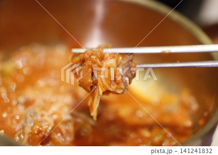 Kimchi Stew Spoonful Close-Up Kimchi Stew Spoonful Close-Up 141241832