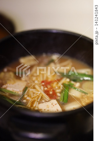 Steaming Hot Pot with Tofu and Mushrooms Steaming Hot Pot with Tofu and Mushrooms 141241843