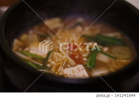 Steaming Hot Pot Soup with Tofu and Mushrooms Steaming Hot Pot Soup with Tofu and Mushrooms 141241844