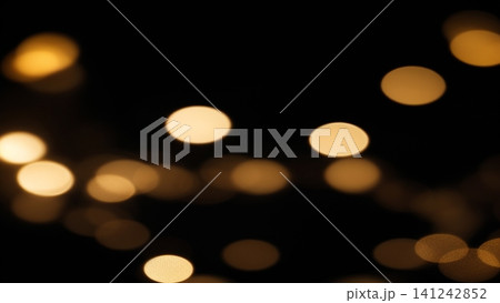 Bokeh of light on a black background Bokeh of light on a black background 141242852