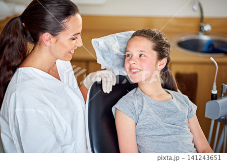 Smile, dentist and woman with child for consultation for healthcare, wellness and orthodontics in clinic. Dental hygiene, doctor and happy kid, patient and pediatrician for medical exam of teeth Smile, dentist and woman with child for consultation for healthcare, wellness and orthodontics in clinic. Dental hygiene, doctor and happy kid, patient and pediatrician for medical exam of teeth 141243651