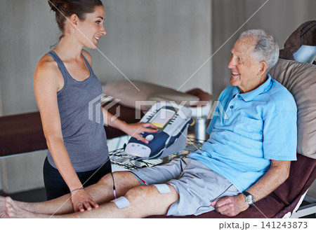 Woman, physiotherapist and bed with senior patient for monitoring vitals, joints or health at clinic. Female person or therapist helping elderly man for therapy, consultation or support at hospital Woman, physiotherapist and bed with senior patient for monitoring vitals, joints or health at clinic. Female person or therapist helping elderly man for therapy, consultation or support at hospital 141243873