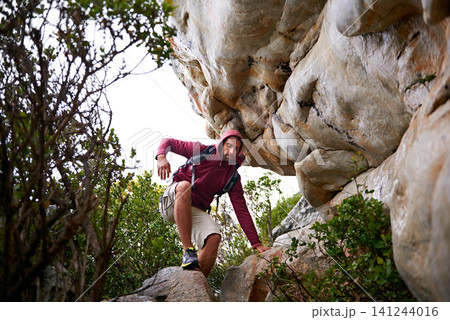 Man, mountain climbing and exercise for adventure outdoor, freedom and journey with travel, focus and strong. Determination, concentration and trekking with challenge, peak and rocks on rough terrain Man, mountain climbing and exercise for adventure outdoor, freedom and journey with travel, focus and strong. Determination, concentration and trekking with challenge, peak and rocks on rough terrain 141244016