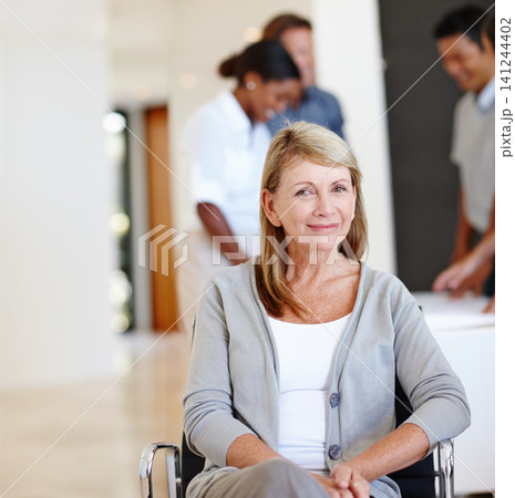 Portrait, business person and woman in a wheelchair, startup and professional in a modern office. Lady with a disability or senior employee with workplace accessibility or inclusion with consultant Portrait, business person and woman in a wheelchair, startup and professional in a modern office. Lady with a disability or senior employee with workplace accessibility or inclusion with consultant 141244402