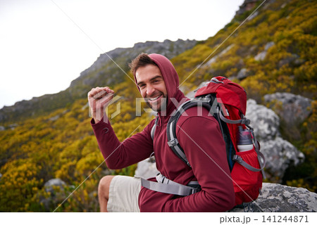 Mountain, man and celebration for hiking in portrait, peak and journey with success and freedom outdoor. Trekking, rock climbing and horizon with fist pump for achievement, travel and adventure Mountain, man and celebration for hiking in portrait, peak and journey with success and freedom outdoor. Trekking, rock climbing and horizon with fist pump for achievement, travel and adventure 141244871