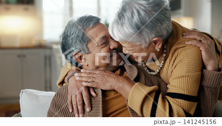 Home, hug and senior couple with love, marriage and retirement with support, bonding and care. Romance, old man and elderly woman embrace, apartment and relationship with trust, romantic and relax 141245156