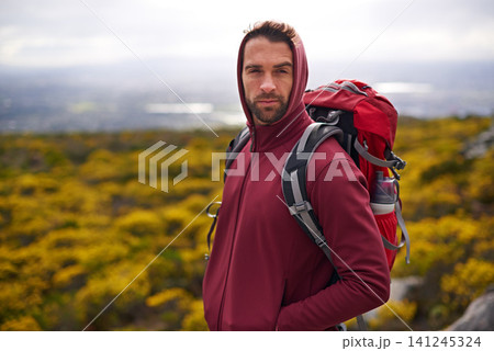 Hiking, serious and face of man on mountain, nature and rock for outdoor adventure with vision. Male person, athlete or sport in environment for exercise, fitness or health with backpack by landscape Hiking, serious and face of man on mountain, nature and rock for outdoor adventure with vision. Male person, athlete or sport in environment for exercise, fitness or health with backpack by landscape 141245324