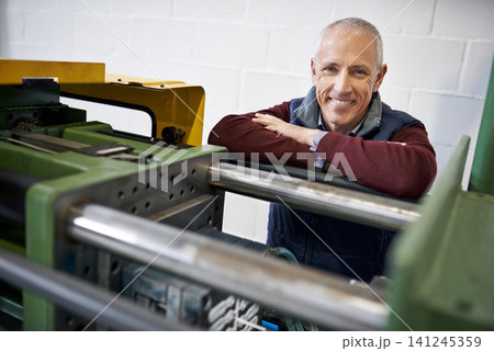 Mature man, factory and machine with warehouse, smile and manufacturing industry maintenance. Engineer, tradesman and system with equipment, repair and happiness with contractor career or job Mature man, factory and machine with warehouse, smile and manufacturing industry maintenance. Engineer, tradesman and system with equipment, repair and happiness with contractor career or job 141245359