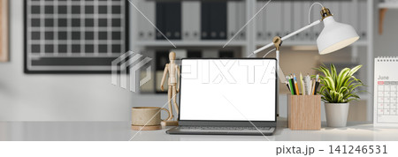 3D Illustrations of Modern Creative Workspace with Laptop Blank Screen, Wooden Mannequin, and Desk Accessories 141246531