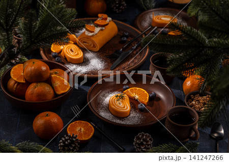 Holiday tangerines, soft cakes, and coffee setting Holiday tangerines, soft cakes, and coffee setting 141247266