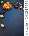 Grilled shrimp platter prepared with fresh lime and spices 141247289