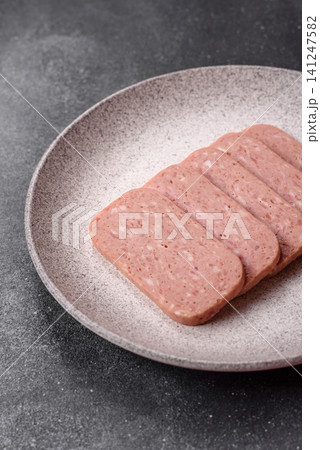Canned spiced ham slices for holiday sandwiches. Ham slices Canned spiced ham slices for holiday sandwiches. Ham slices 141247582