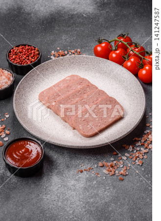 Canned spiced ham slices for holiday sandwiches. Ham slices Canned spiced ham slices for holiday sandwiches. Ham slices 141247587