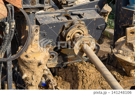 A working horizontal directional drilling machine with a rotating shaft and replaceable robust drill bits. Piping process with torque shaft extension A working horizontal directional drilling machine with a rotating shaft and replaceable robust drill bits. Piping process with torque shaft extension 141248106