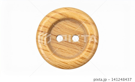Wooden button with two holes on white background Wooden button with two holes on white background 141248437