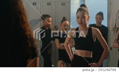 Young Female Mock, Intimidate Curly Haired Teammate While One Girl Records Incident on Smartphone 141248798