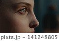 Gymnast Applying Sparkling Eyeshadow to Teammate in Locker Room 141248805