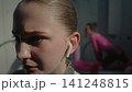Lonely Teen Gymnast Finding Escape in Music Before Big Performance 141248815
