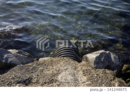 Pipe connecting to the sea Pipe connecting to the sea 141249073