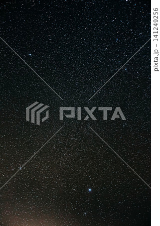 A dark night sky filled with countless twinkling stars. 141249256