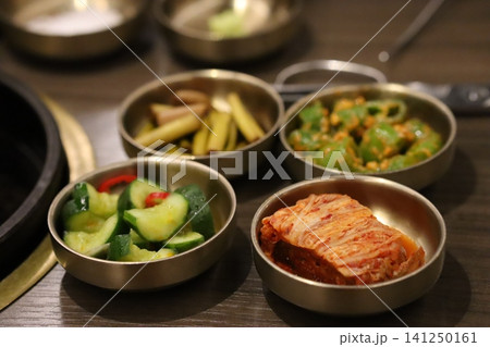 Korean Banchan Side Dishes in Metal Bowls Korean Banchan Side Dishes in Metal Bowls 141250161